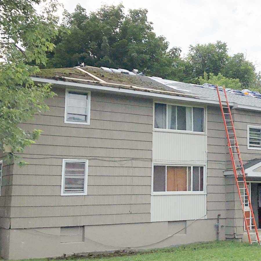 A residential roof replacement in progress in Syracuse Ny